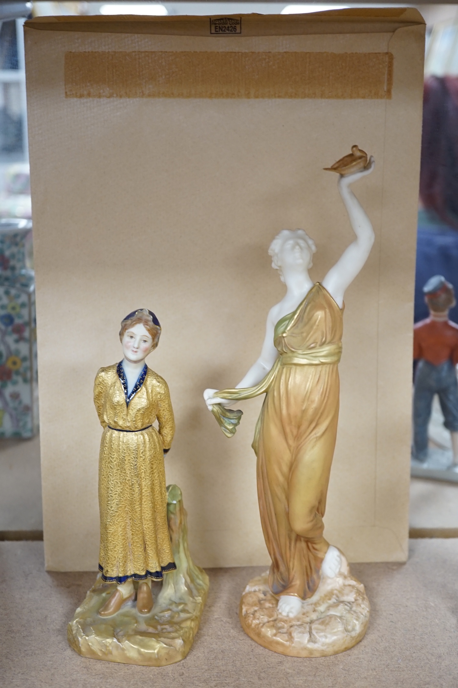 Two Royal Worcester partially gilt figurines including 2214, largest 16cm high. Condition - good